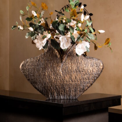 White Floral Arrangement in Sculpted Bronze Vase