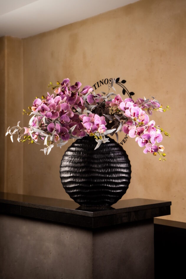 Purple Orchids in Textured Black Vase